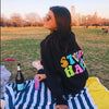 girl on picnic smiling in black classic stupid happy hoodie